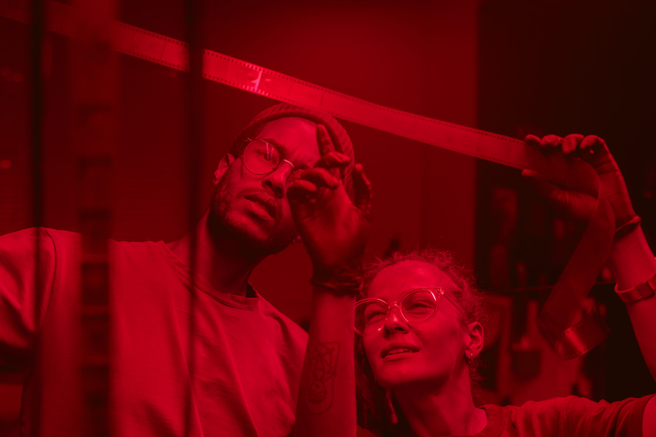 front-view-people-developing-photos-darkroom